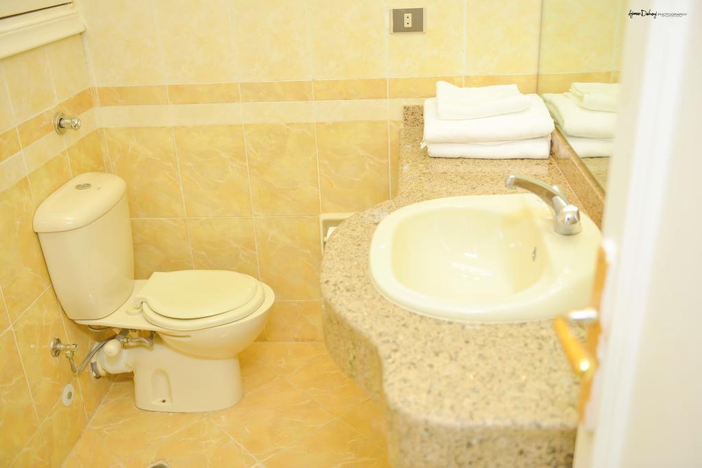 Maxim Inn Marina Lake View El Alamein Room photo